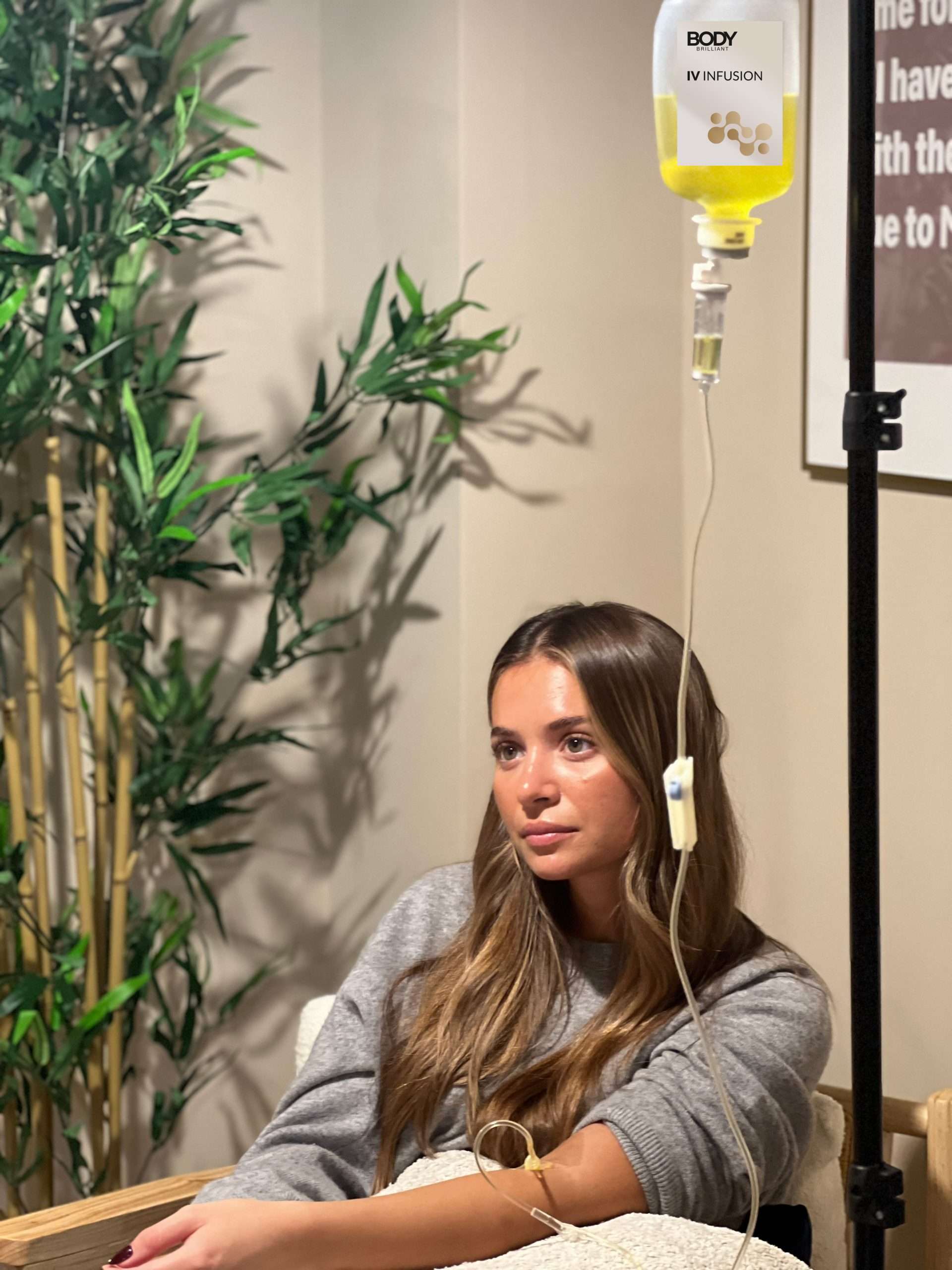IV Infusion Patient Relaxing – Total Health Physiotherapy x Body Brilliant Woman relaxing during IV infusion at Total Health Physiotherapy x Body Brilliant clinic
